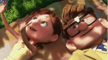 Carl and Ellie Fredrickson from Disney and Pixar's Up laying on a blanket