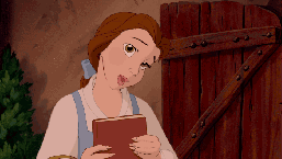 Disney's Belle holding a book